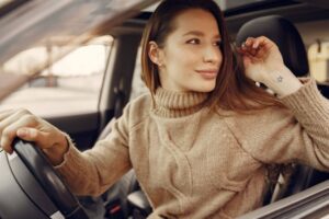 Woman feeling well after getting whiplash treatment after getting a chiropractic lien in San Diego
